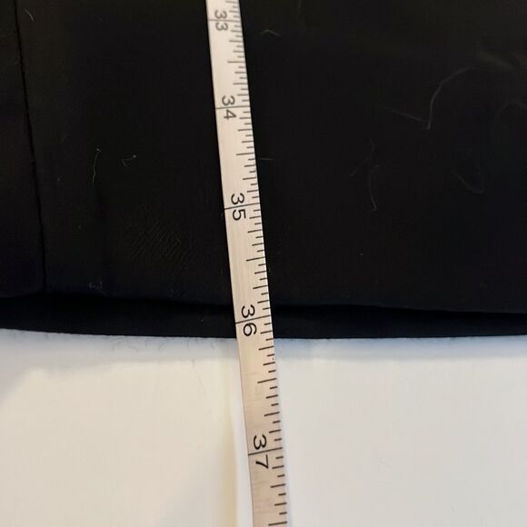 H&M black pull on trousers with zippered pockets. Size 14. Single back pocket. - Picture 9 of 9